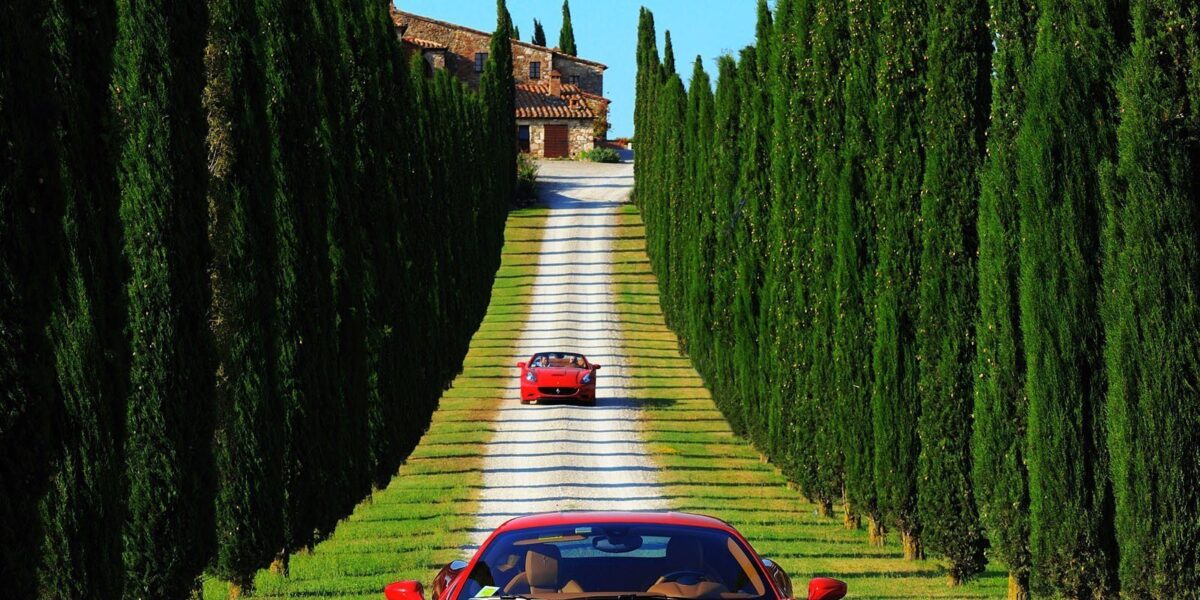 Driving a Ferrari in autumn Tuscany